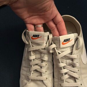 Nike Beige Sneakers with white swish.